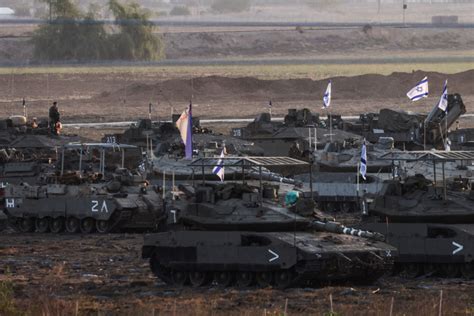 Gaza awaits humanitarian aid, as Israel tells troops to ‘be ready’ for ground invasion